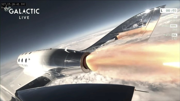 This Thursday, June 29, 2023, image provided by Virgin Galactic show the rocket of the companys spaceplane igniting during a research flight that included Italian specialists who conducted a number of microgravity experiments. With the research flight complete, Virgin Galactic plans to begin commercial flights with paying ticket holders in August. (Virgin Galactic via AP)