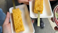 Nikita Willy dan Indra Priawan paling senang jajan dan mencicipi camilan unik. Salah satunya saat keduanya membeli tamago di pasar di Jepang. Foto: Instagram/nikitawillyofficial94