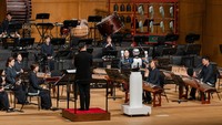 An android robot, EveR 6, is seen as it took the conductors podium to lead a performance by South Koreas national orchestra with human conductor Choi Soo-yeoul, in Seoul, South Korea, June 30, 2023, in this handout picture. National Theater of Korea/Handout via REUTERS    THIS IMAGE HAS BEEN SUPPLIED BY A THIRD PARTY. MANDATORY CREDIT. NO RESALES. NO ARCHIVES