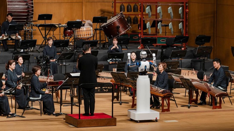 An android robot, EveR 6, is seen as it took the conductor's podium to lead a performance by South Korea's national orchestra with human conductor Choi Soo-yeoul, in Seoul, South Korea, June 30, 2023, in this handout picture. National Theater of Korea/Handout via REUTERS    THIS IMAGE HAS BEEN SUPPLIED BY A THIRD PARTY. MANDATORY CREDIT. NO RESALES. NO ARCHIVES