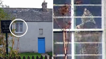 Sosok berkerudung telah difoto di jendela sebuah gedung tempat para pendeta Katolik abad ke-18 mencoba melarikan diri dari penganiayaan. Meskipun tidak ada catatan kematian di seminari, seorang guru bernama John Paterson meninggal di sana karena sebab alami pada tahun 1783. Foto: Pocket-lint