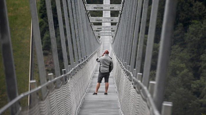 A view of Skywalk, the 664m world's longest free suspended steel rope bridge, built since January 2022 right next to the Nordic Skiing World Cup jumping hill Muehlenkopf Schanze in Willingen, Germany, June 29, 2023. REUTERS/Jana Rodenbusch