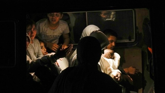 Residents of the Jenin refugee camp fled their homes as the Israeli military pressed ahead with an operation in the area, in Jenin, West Bank, Tuesday, July 4, 2023. Palestinian health officials put the Palestinian death toll from the two-day raid at 10. The Israeli military said Israel launched the operation because some 50 attacks over the past year had emanated from Jenin. (AP Photo/Majdi Mohammed)