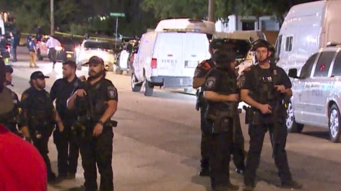 Police arrive on the scene of a deadly shooting late Monday, July 3, 2023 in Forth Worth, Texas.  Authorities say  gunfire erupted following a local festival in the Como neighborhood in the city's southwest.  (WFAA via AP)