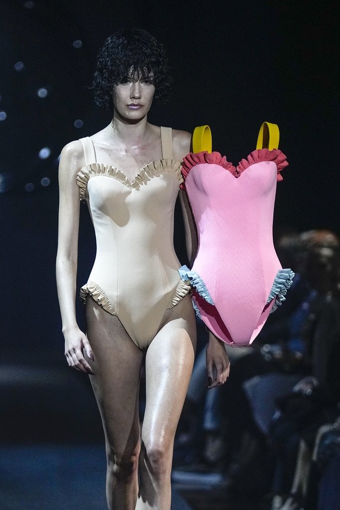 A model wears a creation for the Viktor & Rolf Haute Couture Fall/winter 2023-2024 fashion collection presented in Paris, Wednesday, July 5, 2023. (AP Photo/Michel Euler)