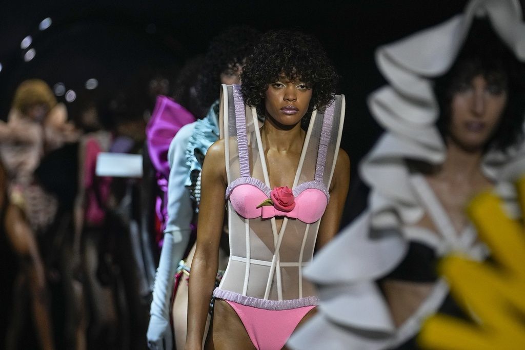 A model wears a creation for the Viktor & Rolf Haute Couture Fall/winter 2023-2024 fashion collection presented in Paris, Wednesday, July 5, 2023. (AP Photo/Michel Euler)
