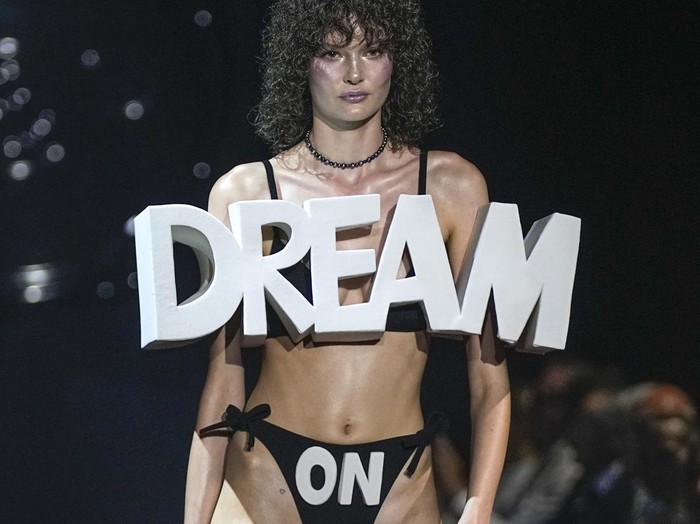 A model wears a creation for the Viktor & Rolf Haute Couture Fall/winter 2023-2024 fashion collection presented in Paris, Wednesday, July 5, 2023. (AP Photo/Michel Euler)