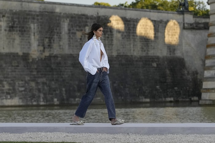 Kaia Gerber wears a creation for the Valentino Haute Couture Fall/winter 2023-2024 fashion collection presented in Chantilly, north of Paris, Wednesday, July 5, 2023. (AP Photo/Christophe Ena)