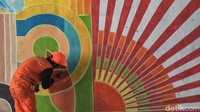 Pembuatan mural ini untuk mempercantik kolong jalan simpang susun Semanggi.  
