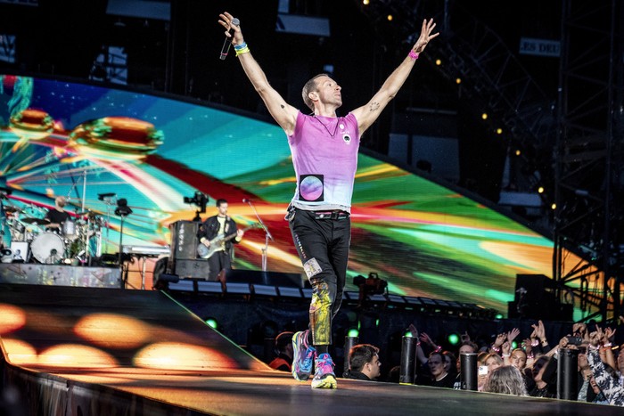 British singer Chris Martin of British band Coldplay performs at Parken Stadium in Copenhagen, Denmark, Wednesday July 5, 2023. The concert is part of the Music of the Spheres World Tour. (Mads Claus Rasmussen/Ritzau Scanpix via AP)