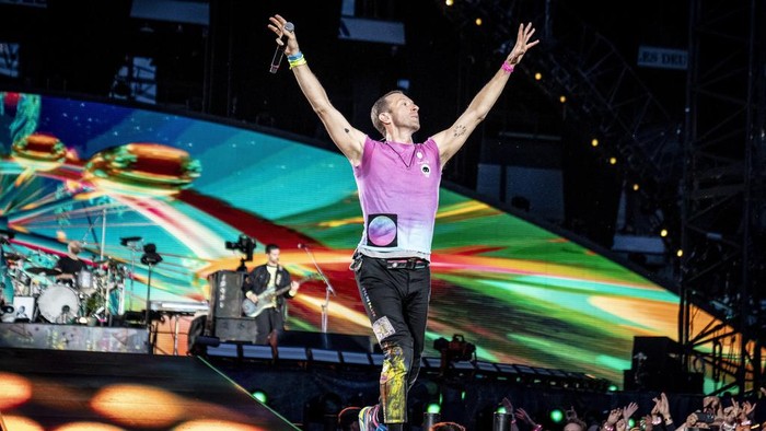 British singer Chris Martin of British band Coldplay performs at Parken Stadium in Copenhagen, Denmark, Wednesday July 5, 2023. The concert is part of the Music of the Spheres World Tour. (Mads Claus Rasmussen/Ritzau Scanpix via AP)