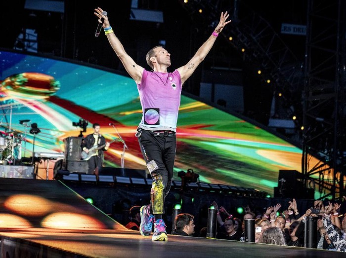British singer Chris Martin of British band Coldplay performs at Parken Stadium in Copenhagen, Denmark, Wednesday July 5, 2023. The concert is part of the Music of the Spheres World Tour. (Mads Claus Rasmussen/Ritzau Scanpix via AP)