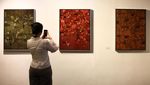 Melihat Pameran Lukisan Di Antara Hujan