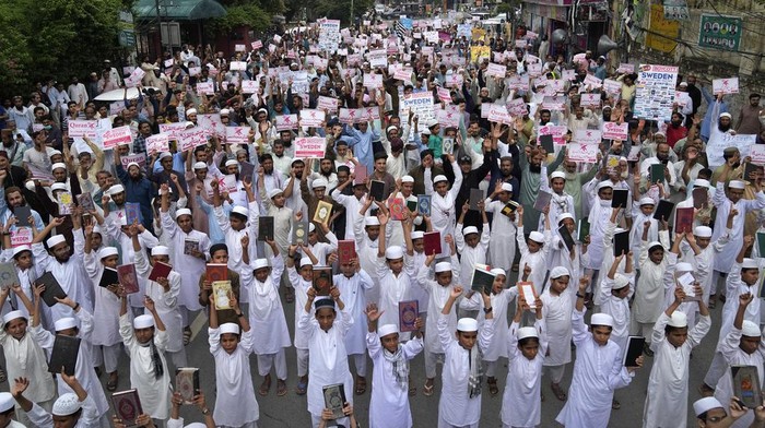 Muslim protesters chant slogans during a rally to denounce the burning of the Islamic holy book 'Quran' that took place in Sweden, in Lahore, Pakistan, Sunday, July 9, 2023. (AP Photo/K.M. Chaudary)
