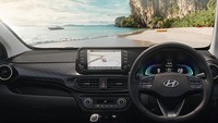 Geser ke bagian interior, Exter mengadopsi desain dasbor seperti model Grand i10 Nios, dan mencakup konsol instrumen digital sepenuhnya dari i20 dan Verna, ventilasi AC bulat, sistem infotainment layar sentuh 8 inci, panel kontrol iklim otomatis, dan konsol tengah dari Grand i10 Nios. Foto: Dok. Hyundai India