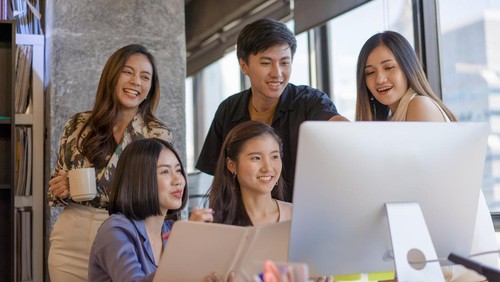 Portrait young asian creative business person working success project with team Business people weare casual suit outfit working happy action in modern Coworking space