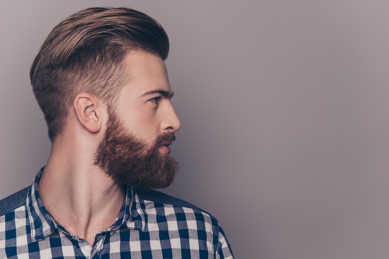 pompadour undercut Side view portrait of thinking stylish young man looking away