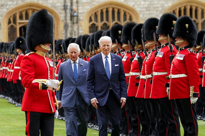U.S. President Joe Biden participates in a ceremonial arrival and inspection of the honour guard with Britains King Charles at Windsor Castle in Windsor, Britain, July 10, 2023. REUTERS/Kevin Lamarque