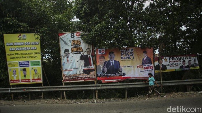 Usai dikeluarkan surat edaran tentang penertiban media promosi partai, nampak baliho hingga spanduk caleg masih bertebaran di Depok, Nih Potretnya!