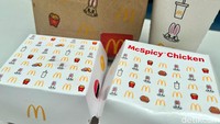 Tak hanya di kantong kertas, logo Bunny juga ada di kemasan karton makanan dan minuman paket menu McD dan NewJeans ini. Gemas ya?