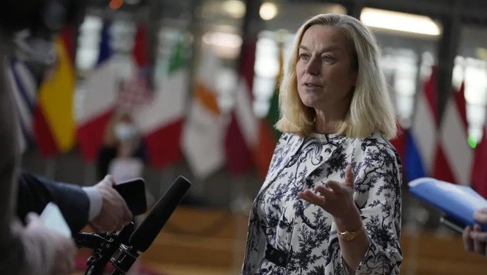 FILE - Dutch Finance Minister Sigrid Kaag speaks with the media as she arrives for a meeting of eurogroup finance ministers at the European Council building in Brussels, Jan. 17, 2022. A man who stood outside the home of former Dutch foreign minister Kaag waving a burning torch and shouting threats was sent to prison Wednesday, Jan. 19 for six months, Dutch media reported.(AP Photo/Virginia Mayo, file)