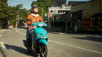 Motor matic itu juga diberi nama Mio Sporty. Tampang depannya mirip dengan Mio Smile atau Mio Sporty generasi kedua yang pernah dipasarkan di Indonesia beberapa tahun ke belakang. Ciri khas lampu sein yang menyatu dengan lampu senja, yang dibuat seolah-olah tersenyum. Foto: Yamaha Filipina