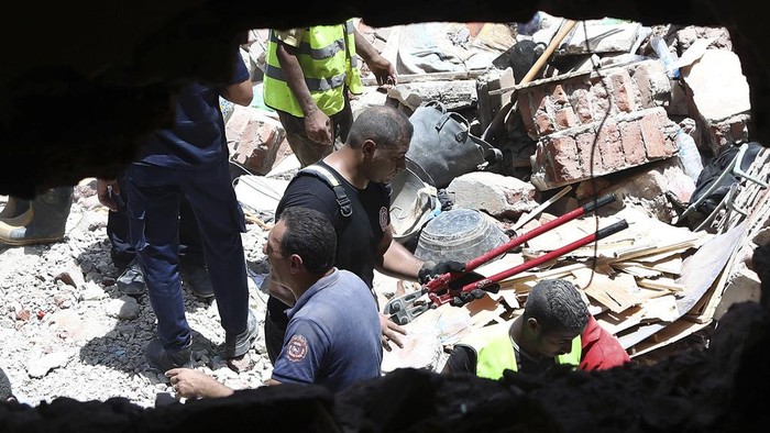 Egypt Building Collapse Rescuers search through the rubble of a collapsed five-story apartment building in Cairo, Egypt, Monday, July 17, 2023. A five-story apartment building collapsed Monday in the Egyptian capital of Cairo, leaving several people dead, authorities said, as rescuers at the scene searched through the rubble. Building collapses are common in Egypt, where shoddy construction and a lack of maintenance are widespread in shantytowns, poor city neighborhoods and rural areas. (AP Photo)