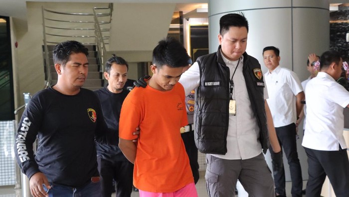 Hermawan Sihotang, tersangka pembunuh wanita hamil yang jasadnya ditumpuk sampah di Jakarta Barat, ditetapkan sebagai tersangka.