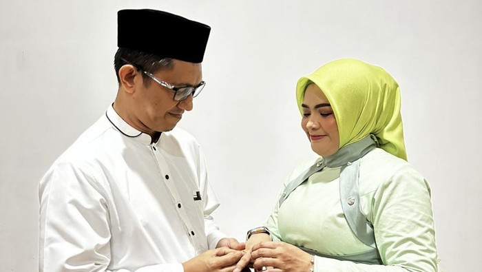 Kadis Kominfo Maros Andi Baso Arman dan Wakil Bupati Maros Suhartina Bohari.