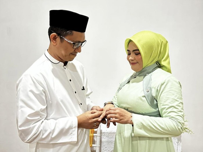 Kadis Kominfo Maros Andi Baso Arman dan Wakil Bupati Maros Suhartina Bohari.