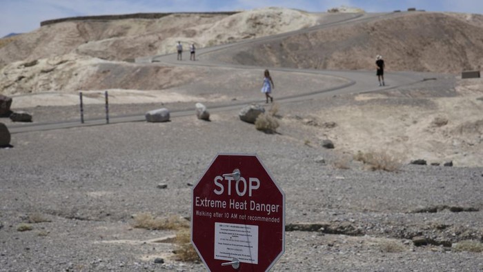 A sign warns of extreme heat danger Sunday, July 16, 2023, in Death Valley National Park, Calif. Death Valleys brutal temperatures come amid a blistering stretch of hot weather that has put roughly one-third of Americans under some type of heat advi