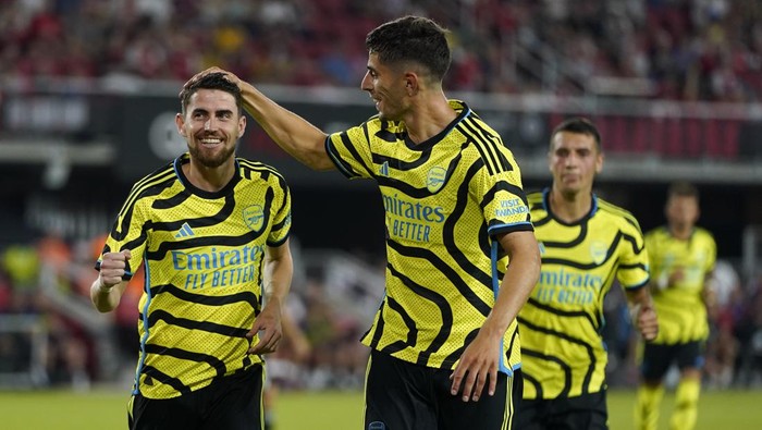 Arsenal midfielder Jorginho, left, celebrates his penalty kick with teammate Kai Havertz in the second half of the MLS All-Star soccer match against the MLS All-Stars, Wednesday, July 19, 2023, in Washington. (AP Photo/Alex Brandon)