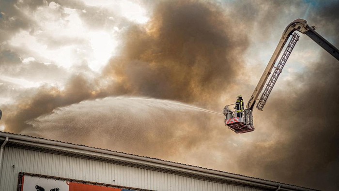 A firefighter works at a site of storage facilities hit during Russian missile and drone strikes, amid Russia's attack on Ukraine, in Odesa, Ukraine July 19, 2023. Ukrainian Presidential Press Service/Handout via REUTERS ATTENTION EDITORS - THIS IMAGE HAS BEEN SUPPLIED BY A THIRD PARTY.     TPX IMAGES OF THE DAY