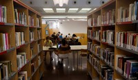 Barcelonas residents sit in a library, designated as the climate shelter point, during the second heatwave of the summer in Barcelona, Spain, July 11, 2023. REUTERS/ Albert Gea