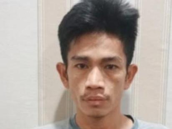 Pelaku saat diamankan polisi