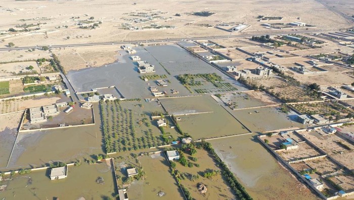 General view of homes, farms and cars after a flood, caused due to damage to a large pipeline that caused a leak, in Ajdabiya, Libya, July 20,2023. Libya Al HADATH/Handout via REUTERS    THIS IMAGE HAS BEEN SUPPLIED BY A THIRD PARTY