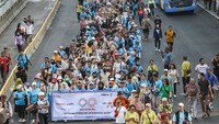 Sejumlah anak Autism mengikuti Walk for Autism di kawasan Sarinah, Jakarta, Minggu (23/7/2023).