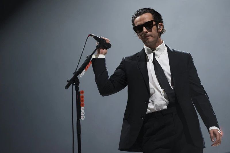 FILE - Matty Healy of the 1975 performs at the Reading Music Festival, England, Sunday, Aug. 28, 2022. Malaysia's government has cut short a music festival after the lead singer of British band The 1975 slammed the country's anti-gay laws and kissed a male bandmate during their performance. Malaysia's communications and digital minister has slammed Matty Healy's conduct late Friday, July 21, 2023 at the start of the Good Vibes Festival as 
