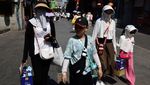 Facekinis Jadi Tren Baru Warga China Gegara Panas Menggila