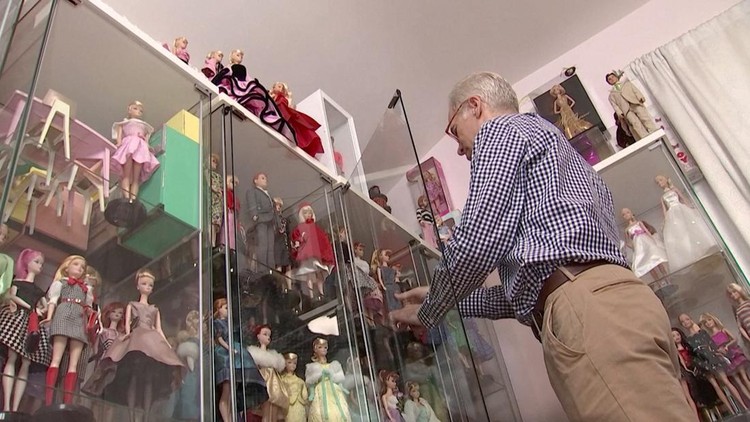 A screen grab shows Matthew Keith speaking in front of his collection of Barbies during an interview with Reuters in Los Angeles, California, U.S., July 21, 2023. REUTERS TV/via REUTERS