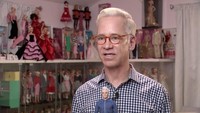 A screen grab shows Matthew Keith speaking in front of his collection of Barbies during an interview with Reuters in Los Angeles, California, U.S., July 21, 2023. REUTERS TV/via REUTERS