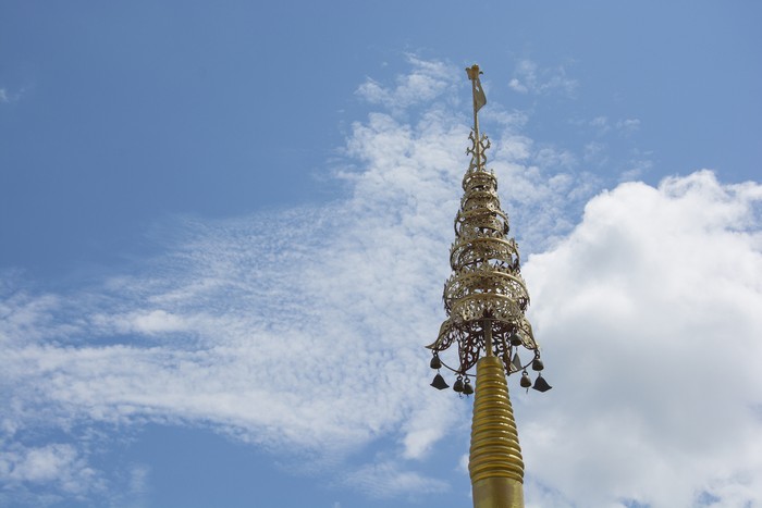 The chatra (umbrella)  an auspicious symbol in Hinduism, Jainism and Buddhism with blue sky background, Thailand, no copyright