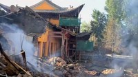Pemandangan kerusakan akibat kebakaran di Kuil Dafo, Zhangye, Provinsi Gansu, China, Senin (24/7/2023).