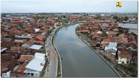 Paket I di antaranya pembangunan kolam retensi dan kolam tambat kapal, area pelimpah, rumah pompa, bendung gerak, parapet Sungai Loji, dan bangunan regulator gate. Foto: Dok. Kementerian PUPR