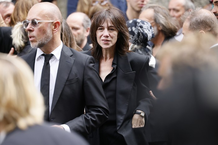 Jane Birkins daughter Charlotte Gainsbourg leaves after Jane Birkins funerals ceremony at the Saint-Roch church in Paris, Monday, July 24, 2023. Actor and singer Jane Birkin, who made France her home and charmed the country with her English grace, natural style and social activism, has died last week at age 76. (AP Photo/Thomas Padilla)