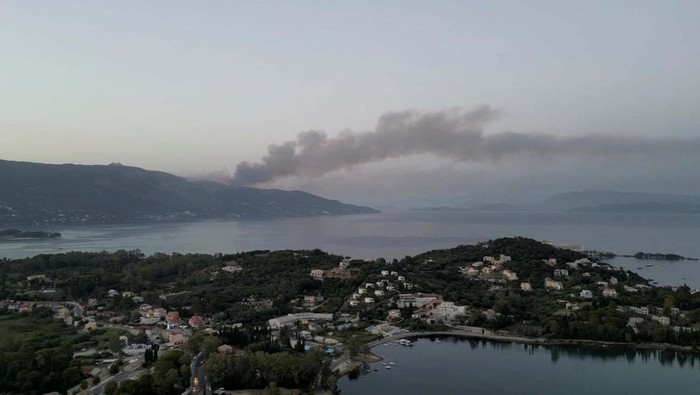 Plumes of smoke rise from a wildfire on the island of Corfu, Greece July 23, 2023 in this picture obtained from social media. TikTok @djidronepiloot/via REUTERS  THIS IMAGE HAS BEEN SUPPLIED BY A THIRD PARTY. MANDATORY CREDIT. NO RESALES. NO ARCHIVES.