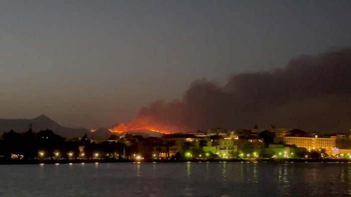 Plumes of smoke rise from a wildfire on the island of Corfu, Greece July 23, 2023 in this picture obtained from social media. TikTok @djidronepiloot/via REUTERS  THIS IMAGE HAS BEEN SUPPLIED BY A THIRD PARTY. MANDATORY CREDIT. NO RESALES. NO ARCHIVES.