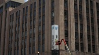 A worker uses a smartphone while dismantling a Twitters sign at Twitters corporate headquarters building as Elon Musk renamed Twitter as X and unveiled a new logo, in downtown San Francisco, California, U.S., July 24, 2023. REUTERS/Carlos Barria TPX IMAGES OF THE DAY