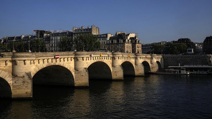 The Pont Neuf is photographed in Paris, Friday, June 2, 2023. The first Olympic Games since the ebb of the COVID-19 pandemic open in a year in France’s capital. (AP Photo/Michel Euler)