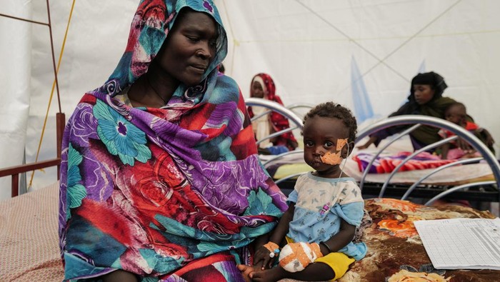 Saouzane Souleman, a Sudanese girl who fled with her family the conflict in Geneina, in Sudans Darfur region, suffering from malnutrition lies at Medecins Sans Frontieres (MSF) mission hospital in Adre, Chad July 24, 2023. REUTERS/Zohra Bensemra